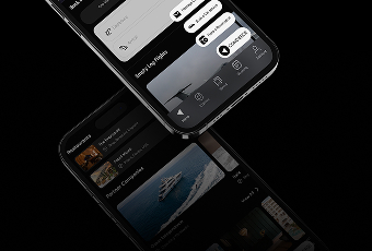iPhone displaying the Amalfi Jets app with the Amalfi Reserve screen, resting upright against a textured grey rock.