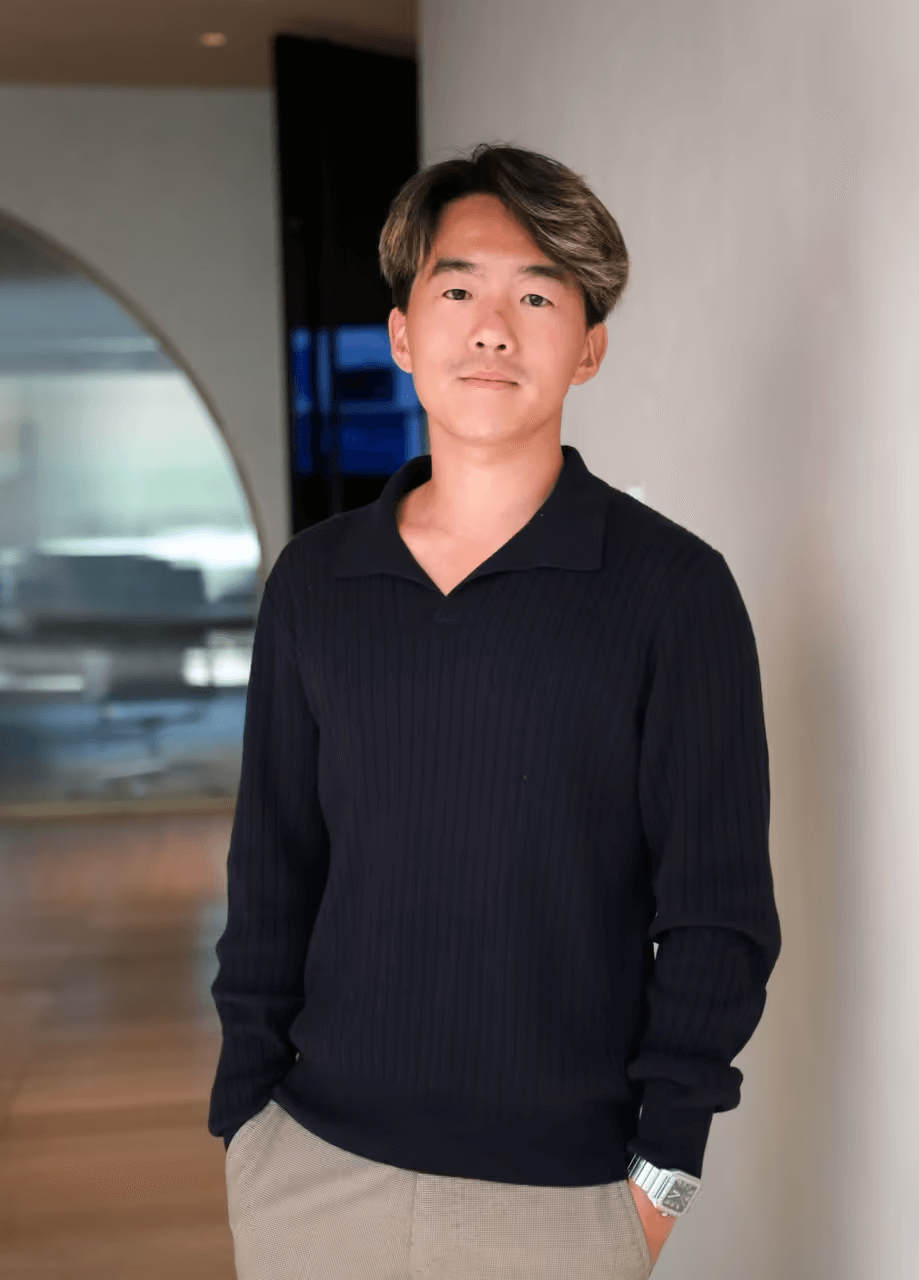 Calvin Yoon, the co-founder and chief operations officer, posing in front of the Amalfi Jets headquarters.