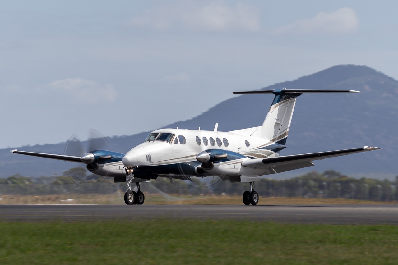Beech B200 Super King Air twin engine turboprop aircraft on the runway at Avalon airport.