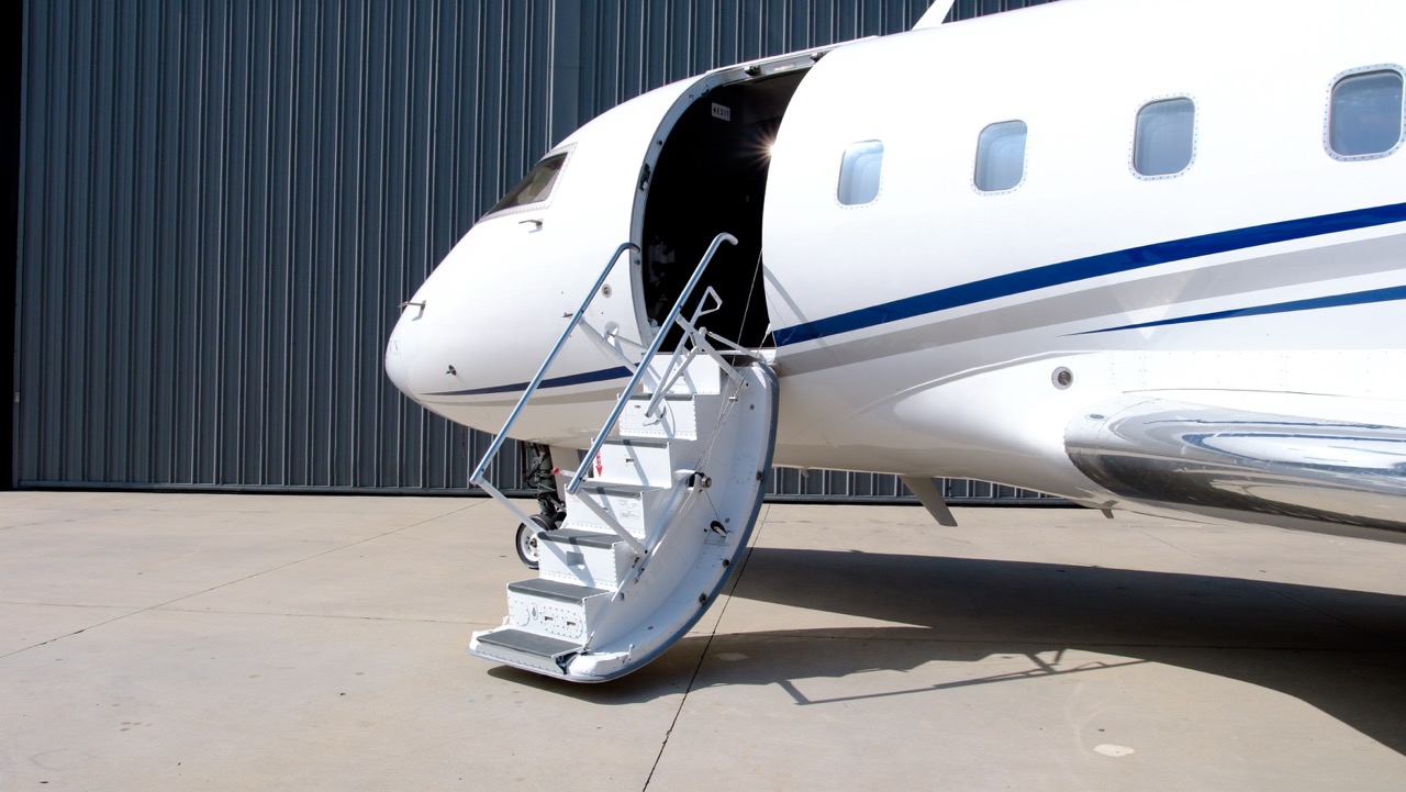 Gulfstream G200 heavy jet exterior parked on runway, built for intercontinental travel and corporate charters.