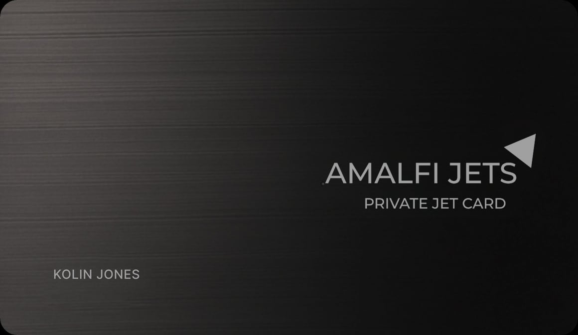 Black Amalfi Jets private jet card, brushed metal, embossed with the Amalfi Jets wordmark.