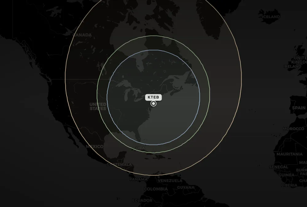 Dark world map with great-circle range rings around a departure airport — explore how far each Amalfi aircraft can fly.
