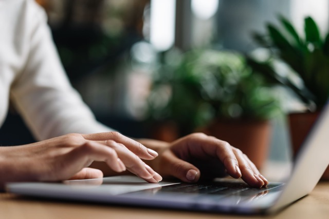 Team member coordinating trip accommodations through a seamless digital experience