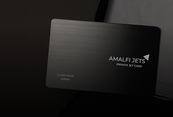 The Amalfi One Jet Card displayed in a sleek black case, symbolizing luxury membership and global air travel